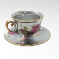 Vintage Porcelain Teacup And Saucer Set With Floral Pattern And Gold Trim