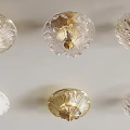 Elegant Ceiling Lights With Transparent Glass And Gold Accents In Various Designs