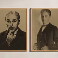 Two Vintage Portrait Paintings of Men in Suits with Wooden Frames Hanging on Wall