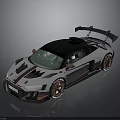 Racing Style Sports Car With Black Roof Large Rear Spoiler And Bronze Wheels
