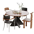 Round Wooden Table and Mixed Design Chairs with Decorative Green Vase