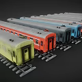 Colorful Model Train Cars in Various Colors Parked on Tracks with Windows