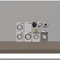 Various Front Load Washing Machines In White And Gray With Stackable Designs