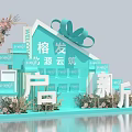 Blue Themed Housing Project Display With House Shaped Structure And Floral Decorations