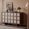 Wooden Entryway Console Cabinet with Decorative Panels Table Lamp Vase Flowers and Laptop