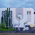 Outdoor Garden Feature Wall With Cacti Deer Sculptures Circular Mirror And Lighting