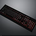 Black Computer Keyboard With Red Accents And Standard Key Layout Design