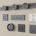 Different types of modern switch panels with wall mounted designs in grey and white colors