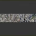 Natural Rocky Cliff Structure With Calm Water Surface Reflection