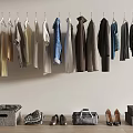Stylish Clothing Hanging On Wall Hangers With Bags Shoes And Storage Boxes