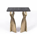 Modern Elegant Side Table With Dark Surface Top And Golden Curved Sculptural Legs Design