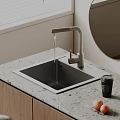 Modern Kitchen Sink With Brass Faucet Grey Countertop Round Mirror And Starbucks Cup