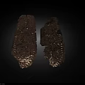 Two Ancient Artifacts With Rough Textured Surface Displayed On Dark Background
