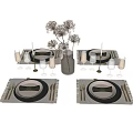 Stylish Tableware Set Featuring White Plates Black Napkins Silver Cutlery Wine Glasses And Candle Holders