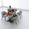Minimalist Indoor Setting With Round Table And Green Gray Chairs For Two People