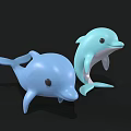 Two Blue And Light Blue Dolphin Toys Standing On Black Background For Aquatic Animal