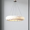 Elegant Modern White Chandelier With Wavy Texture Hanging In Minimalist Space