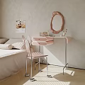 Modern Pink Dressing Table With Oval Mirror Cosmetics And Chair In Bedroom