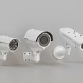Various Types Of White Surveillance Cameras Mounted On Wall For Security Monitoring