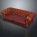 Classic Red Tufted Sofa With Ornate Armrests And Detailed Stitching