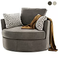 Cozy Beige Round Accent Chair Interior With Chevron Pillows And Green Throw Blanket