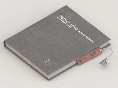 Volker Hitzig Book With Gray Textured Cover And Leather Tag Design 3d model