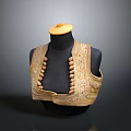 Gold Embroidered Vest With Beaded Decorations On Black Mannequin And Yellow Cap