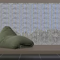 Green Bean Bag Chair by Window in Modern Room with Natural Light and Window Blinds