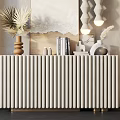 Modern Entryway Console Cabinet With White Vertical Slats Gold Legs And Decorative Plants