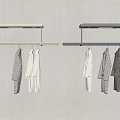 Modern Clothes Rack Design With Hanging Black White And Gray Garments
