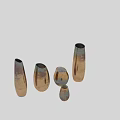 Metallic Decorative Vases With Copper Green Hues In Various Shapes On Table
