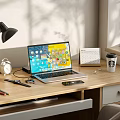 Organized Home Office Desk With Laptop Desk Lamp Calendar Alarm Clock And Coffee Cup
