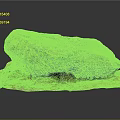 Natural Rock Formation With Yellow Moss On Green Grass Surface Surrounded By Small Plants