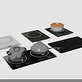 Various Induction Cooktops With Pots Lids And Modern Kitchen Appliances