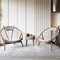 Woven Rattan Chairs With Small Table Set In Natural Minimalist Interior