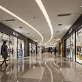 Modern Shopping Mall Stores Corridor With Glass Storefronts Shoppers And Elegant Lighting