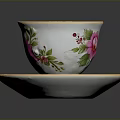 Porcelain Teacup and Saucer with Colorful Floral Patterns and Gold Rim