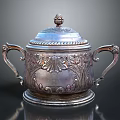 Vintage Silver Lidded Electric Appliance With Decorative Handles And Ornate Patterns