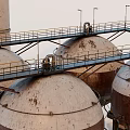 Industrial Equipment with Various Shapes Sizes Ladders Pipes and Metal Structure
