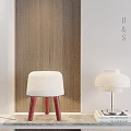 Modern Table Lamp With White Lampshade And Metal Stand On Tabletop With Stack Of Books