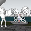 Butterfly Sculpture Photo Spot With Night Lighting And Waterfront View