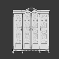 Classic Light Colored Wardrobe With Intricate Carved Patterns And Golden Decorative Trim