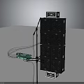 Black Audio Speaker Stack with Top Display Screen Connected Cables and Green Device for Stage