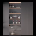 Modern Wine Cabinet With Glass Door And LED Lighting Displaying Wine Bottles And Glasses