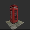 Iconic Red British Telephone Booth With Glass Windows On Urban Pavement