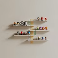 Colorful Wall Decor With Mounted Shelves Holding Small Figurines On Yellow Blue Red Layers