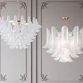 Elegant White Glass Petal Chandeliers With Gold Metal Accents On Gray Wall