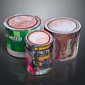 Three Colorful Paint Cans With Rusty Lids And Brand Labels