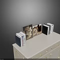 White Entryway Console Sideboard with Gold Accents and Decorative Books Vase on Top