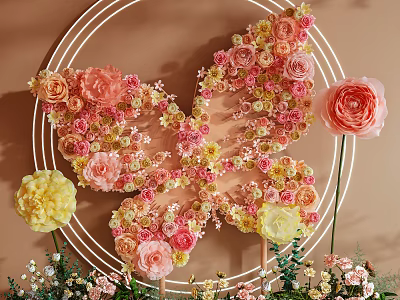 Butterfly Shaped Floral Installation With Pink Yellow Peach Flowers And Circular Frame 3d model